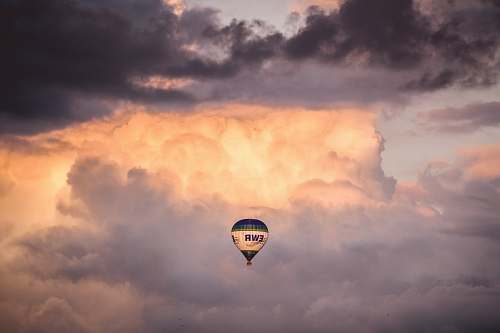 hot air balloon hot air balloon under the clouds weather